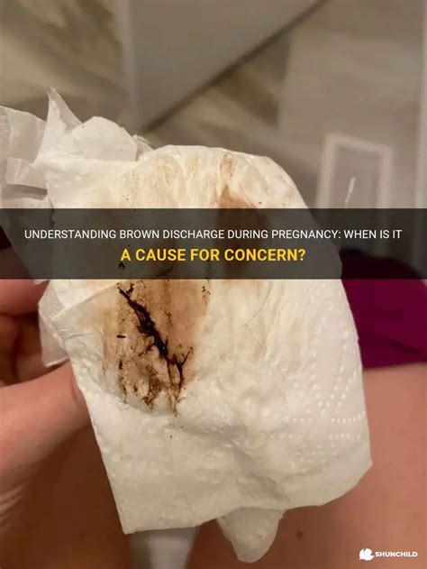 thick brown discharge and faint pregnancy test|brown discharge in pregnancy.